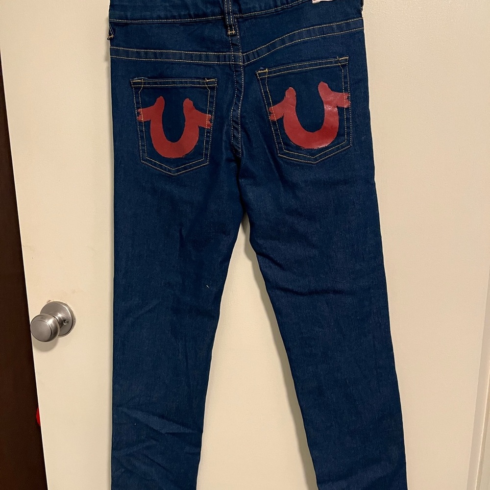 True Religion Blue Skinny Jeans with Red Horseshoe Accents